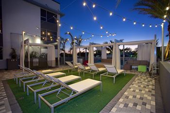 Poolside cabanas and hot tub